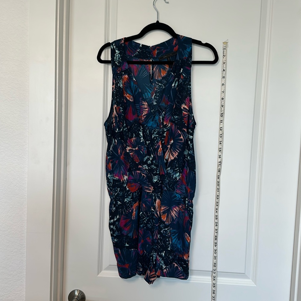 BCBG romper. Many w many colors. Size L